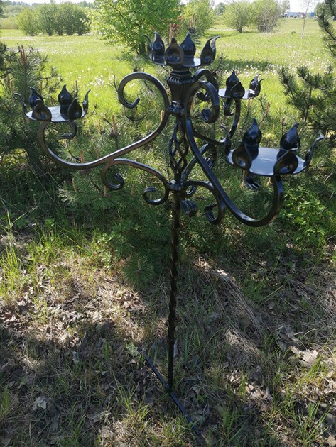 Wrought metal candlesticks for graves